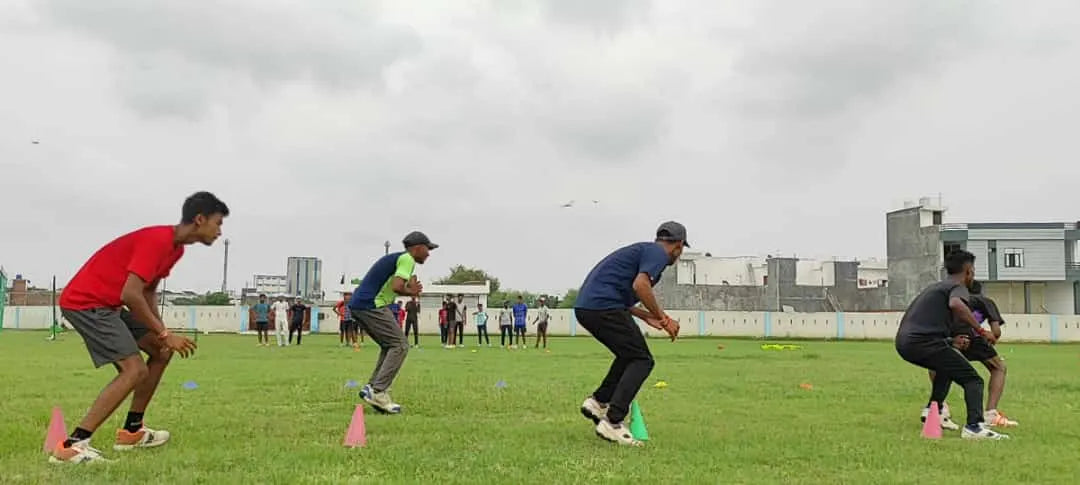 Cricket players training fitness in the ground