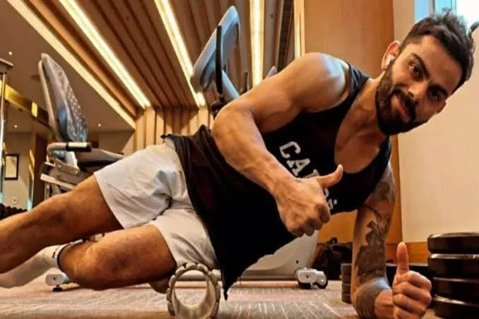 Virat Kohli doing foam rolling during a gym session