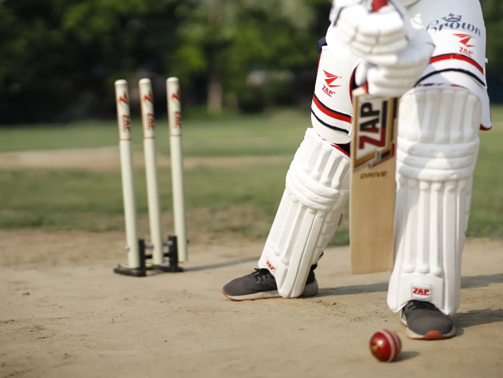 A Batsman with a ZAP Cricket bat in hand shows a proper demonstration of footwork