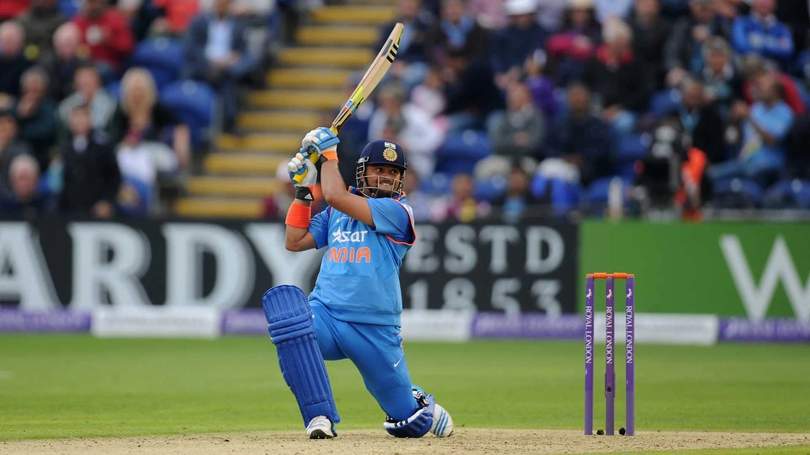 Suresh Raina plays his trademark inside out cricket shot