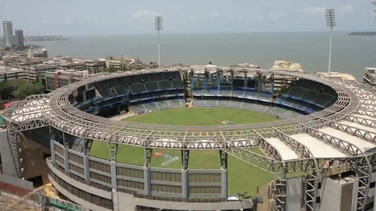 An aerial view of the Wankhede Cricket Ground with the Arabian Sea in the background