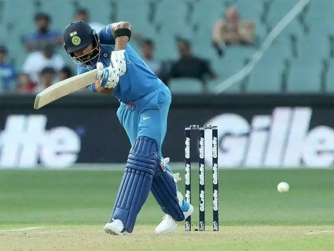 Virat Kohli plays his trademark flick shot in cricket