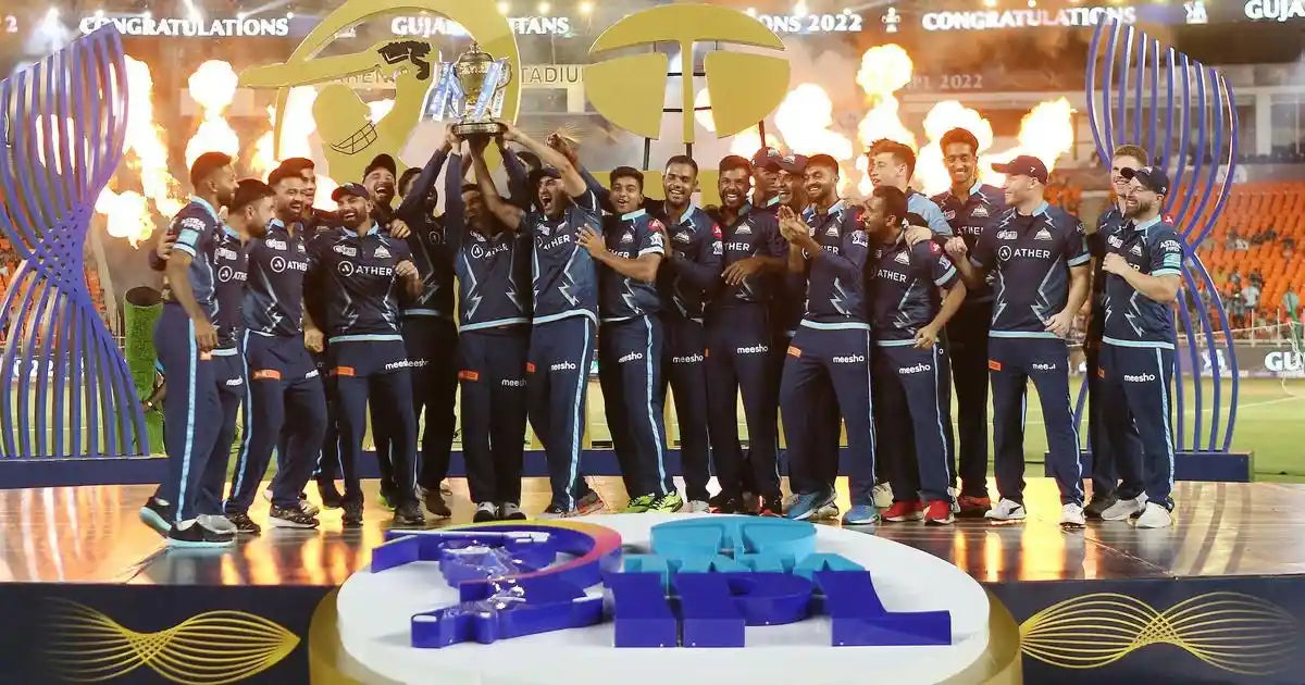 The Gujarat Titans IPL Team celebrate with the IPL Trophy