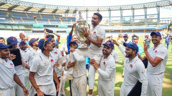 Dhawal Kulkarni and the Mumbai Cricket Team celebrate winning the Ranji Trophy in 2024