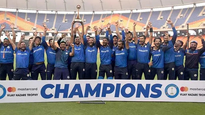 The Saurashtra Team celebrate after winning the Vijay Hazare Trophy