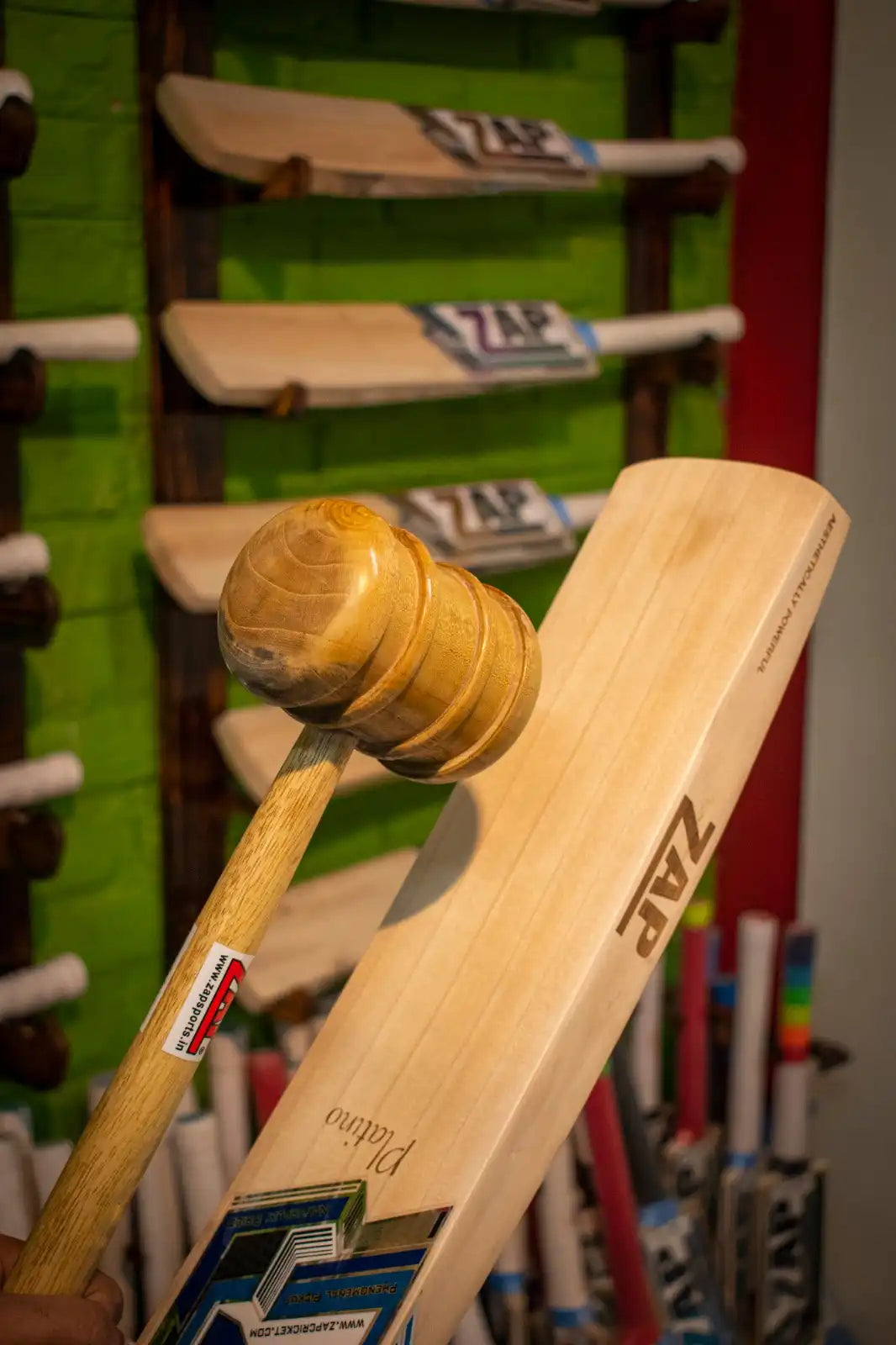 Knocking a cricket bat with a bat mallet