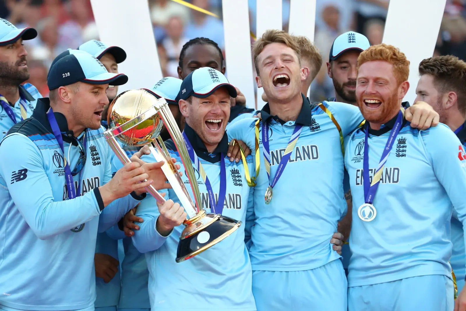 The England Cricket Team players celebrate with the World Cup Trophy