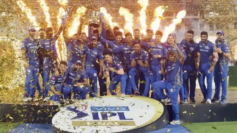 The Mumbai Indians Cricket Team players celebrate after winning the IPL Trophy