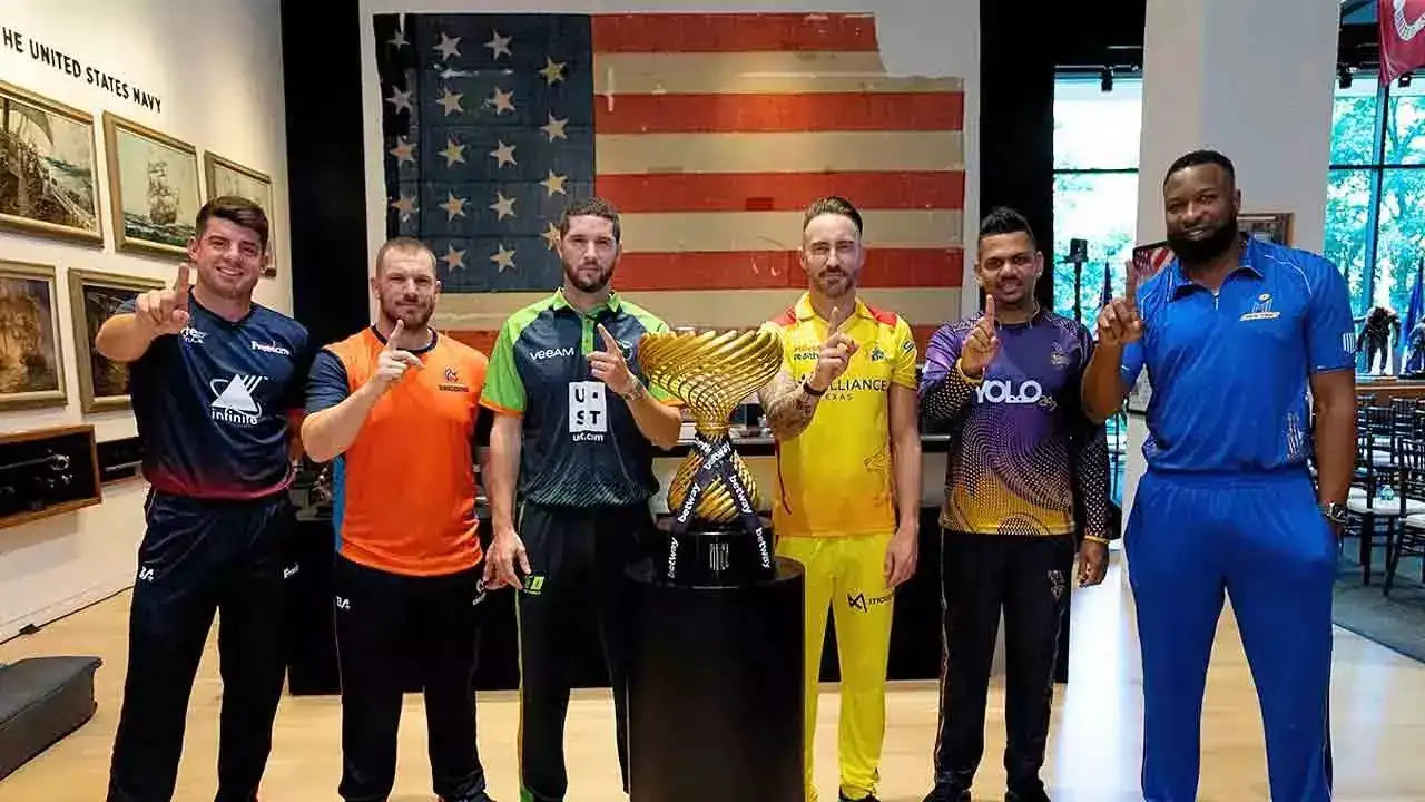 The Major League Cricket Team Captains pose with the trophy