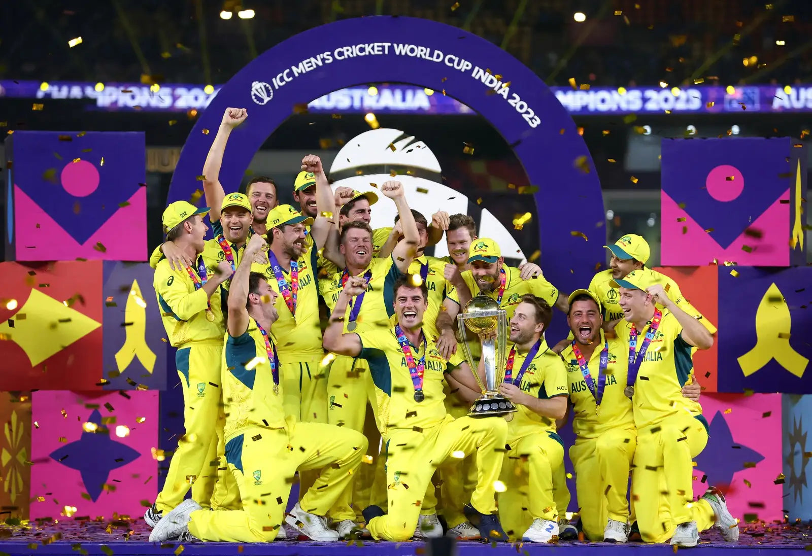 The Australian Cricket Team players celebrate winning the World Cup Trophy
