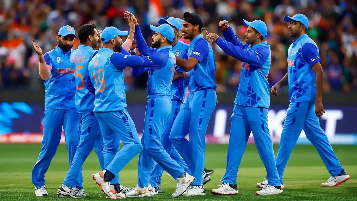 The Indian Men's Cricket Team Celebrates a wicket together
