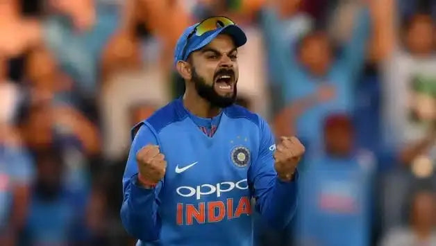Virat Kohli celebrates a victory as the Indian Cricket Team captain